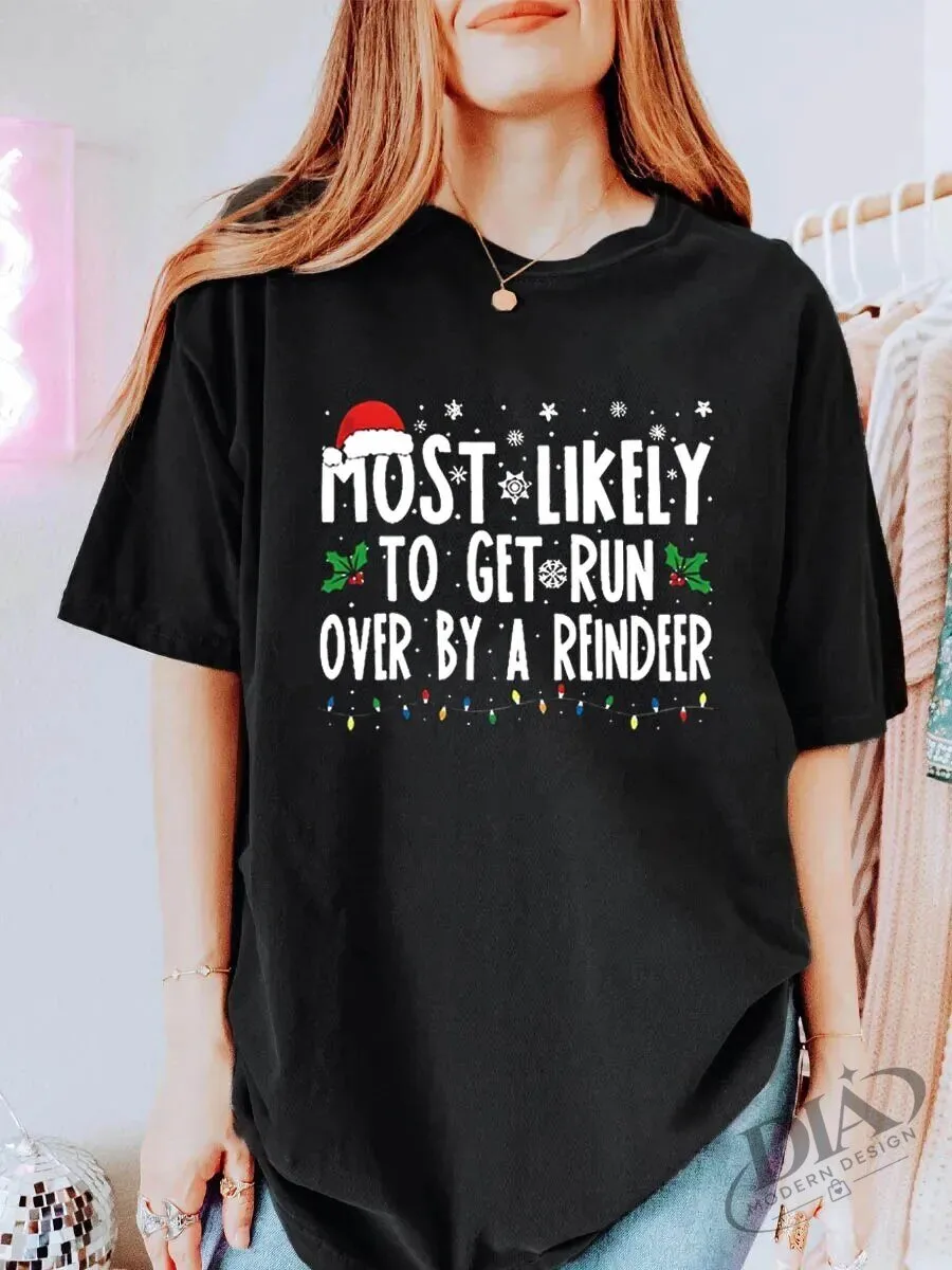 Funny Christmas T-Shirt: Most Likely To Be Run Over By A Reindeer